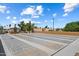 Outdoor shuffleboard courts with painted lines and surrounding benches at 427 S 80Th Way, Mesa, AZ 85208