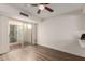 Bright additional living space, features wood-look floors and patio access at 4722 W Via Cynthia --, Glendale, AZ 85301