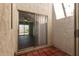 Private patio featuring brick pavers and a view to the bedroom at 4722 W Via Cynthia --, Glendale, AZ 85301