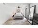 Comfortable bedroom with neutral tones, a ceiling fan, and access to the outdoors through sliding glass doors at 5051 E Lafayette Blvd, Phoenix, AZ 85018