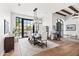 Elegant dining room with a large table, stylish chandelier, and views of the mountain at 5051 E Lafayette Blvd, Phoenix, AZ 85018