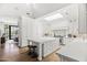 Bright kitchen with a large island, skylight, and modern appliances at 5051 E Lafayette Blvd, Phoenix, AZ 85018