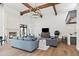 Bright living room with hardwood floors, a fireplace, and comfortable seating at 5051 E Lafayette Blvd, Phoenix, AZ 85018