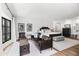 Spacious main bedroom with seating area, decorative rug, and neutral color palette at 5051 E Lafayette Blvd, Phoenix, AZ 85018