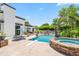 Resort-style backyard with pool, spa, and lounge area, ideal for relaxation and enjoying the outdoors at 5051 E Lafayette Blvd, Phoenix, AZ 85018