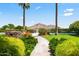 Lush backyard landscaping with a stone pathway leading to a mountain view at 5051 E Lafayette Blvd, Phoenix, AZ 85018