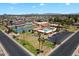 A neighborhood view showcasing community amenities like pools, courts, and parking at 520 S Greenfield Rd # 7, Mesa, AZ 85206