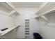 This walk-in closet offers ample shelving and storage space at 520 S Greenfield Rd # 7, Mesa, AZ 85206