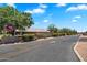 A picturesque street view of the Sunland Villas III neighborhood entrance at 520 S Greenfield Rd # 7, Mesa, AZ 85206