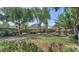Large backyard showcasing lush landscaping and a privacy fence, creating a serene outdoor space at 5733 E Jaeger St, Mesa, AZ 85205
