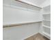 Walk-in closet equipped with shelves and clothing racks offering ample storage space at 5733 E Jaeger St, Mesa, AZ 85205