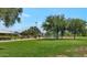 Community park featuring playground equipment, covered picnic tables and ample green space at 5733 E Jaeger St, Mesa, AZ 85205