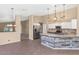 Stylish kitchen featuring stainless steel appliances, modern countertops, and a mosaic backsplash at 5733 E Jaeger St, Mesa, AZ 85205