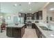 Modern kitchen with stainless steel appliances, granite countertops, and a center island at 60 S Agua Fria Ln, Casa Grande, AZ 85194