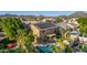 Aerial view of the house highlighting the large solar panel system and private swimming pool at 6961 W Honeysuckle Dr, Peoria, AZ 85383