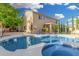 Large backyard with sparkling pool, mature landscaping, and a well-maintained lawn at 6961 W Honeysuckle Dr, Peoria, AZ 85383