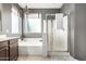 Bathroom with tub, shower, and cabinet vanity at 6961 W Honeysuckle Dr, Peoria, AZ 85383