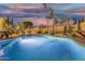 Backyard pool with ample space for entertaining and desert landscaping at 6961 W Honeysuckle Dr, Peoria, AZ 85383