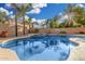 Beautiful pool with mature landscaping, providing a serene and private outdoor retreat at 6961 W Honeysuckle Dr, Peoria, AZ 85383