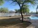Seating near an inviting backyard pool provides relaxation and outdoor enjoyment at 7044 E Ann Way, Scottsdale, AZ 85254