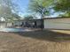 A backyard pool view shows the patio and desert landscaping at 7044 E Ann Way, Scottsdale, AZ 85254