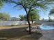 Seating near an inviting backyard pool provides relaxation and outdoor enjoyment at 7044 E Ann Way, Scottsdale, AZ 85254