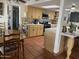 Bright kitchen featuring ample counter space, and a breakfast bar at 7044 E Ann Way, Scottsdale, AZ 85254