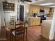 Traditional kitchen and dining area featuring terracotta tile floors at 7044 E Ann Way, Scottsdale, AZ 85254