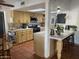 Bright kitchen featuring ample counter space, and a breakfast bar at 7044 E Ann Way, Scottsdale, AZ 85254