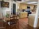 Traditional kitchen and dining area featuring terracotta tile floors at 7044 E Ann Way, Scottsdale, AZ 85254