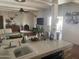 Living room featuring an open layout, seamless flow to the kitchen, and comfortable seating at 7044 E Ann Way, Scottsdale, AZ 85254