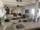 View of the living room with a fireplace from kitchen, creating a seamless flow between spaces at 7044 E Ann Way, Scottsdale, AZ 85254
