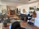 Spacious living room featuring an open floor plan, plants, and tile flooring at 7044 E Ann Way, Scottsdale, AZ 85254