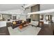 Open-concept living space featuring a modern kitchen, fireplace and comfortable seating area at 7806 E Via De La Entrada --, Scottsdale, AZ 85258