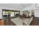 Living room with sliding glass doors and access to a private backyard with a pool and patio at 7806 E Via De La Entrada --, Scottsdale, AZ 85258