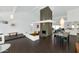 Bright and airy living room with tile flooring, brick fireplace and modern lighting at 7806 E Via De La Entrada --, Scottsdale, AZ 85258