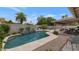 Wonderful backyard showcasing a sparkling pool, a custom built-in grill, and poolside patio that creates relaxation at 7806 E Via De La Entrada --, Scottsdale, AZ 85258