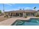 An inviting pool area with lounge chairs on the patio, providing a tranquil retreat for relaxation at 7806 E Via De La Entrada --, Scottsdale, AZ 85258