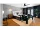 Stylishly decorated main bedroom featuring a modern bed frame, eye-catching wallpaper, and eclectic decor at 8001 E Voltaire Ave, Scottsdale, AZ 85260