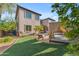 Backyard with artificial turf and a cabana beside the pool at 824 W Whitten St, Chandler, AZ 85225