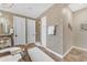 Well-appointed bathroom with tile floors, tiled walk-in shower, dual sinks, and lots of storage at 824 W Whitten St, Chandler, AZ 85225
