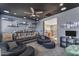 Cozy bonus room with comfortable seating, ceiling fan and shelving at 824 W Whitten St, Chandler, AZ 85225
