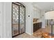 Butler's pantry with granite counters and custom cabinetry, providing ample storage and workspace at 824 W Whitten St, Chandler, AZ 85225