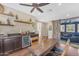 Upstairs dining area with a serving bar, wood floors, and a decorative sliding barn door at 824 W Whitten St, Chandler, AZ 85225