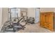 Dedicated home gym featuring weight training equipment and natural light for a healthy lifestyle at 824 W Whitten St, Chandler, AZ 85225