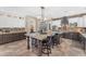 Spacious kitchen with an island, stainless steel appliances, and custom cabinetry at 824 W Whitten St, Chandler, AZ 85225