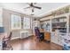 Home office with built-in shelves and desk, perfect for a workspace in a natural light at 824 W Whitten St, Chandler, AZ 85225