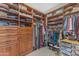 Spacious walk-in closet featuring custom built-in shelves and drawers at 824 W Whitten St, Chandler, AZ 85225