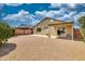 A spacious backyard features a large patio and privacy wall at 8501 W Highland Ave, Phoenix, AZ 85037