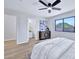 Primary bedroom with ensuite bathroom and back yard view at 8501 W Highland Ave, Phoenix, AZ 85037